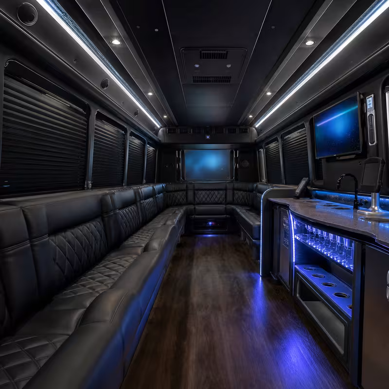Party bus interior with wraparound leather seating and LED lighting in Jacksonville