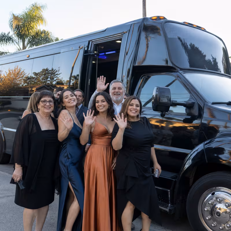 Passengers loading luggage while boarding an Jacksonville group shuttle