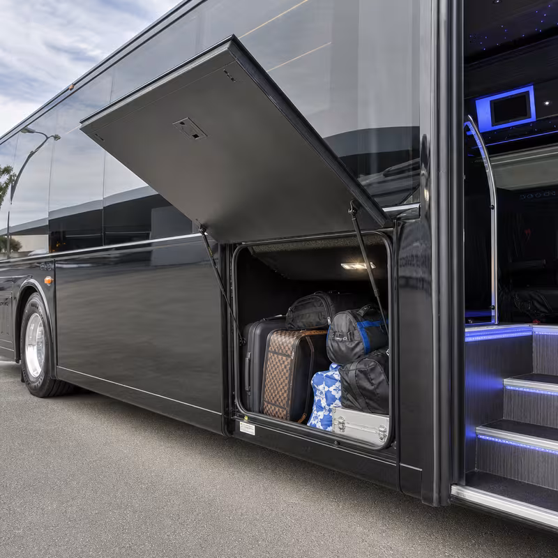 Party bus interior with wraparound leather seating and LED lighting in Jacksonville