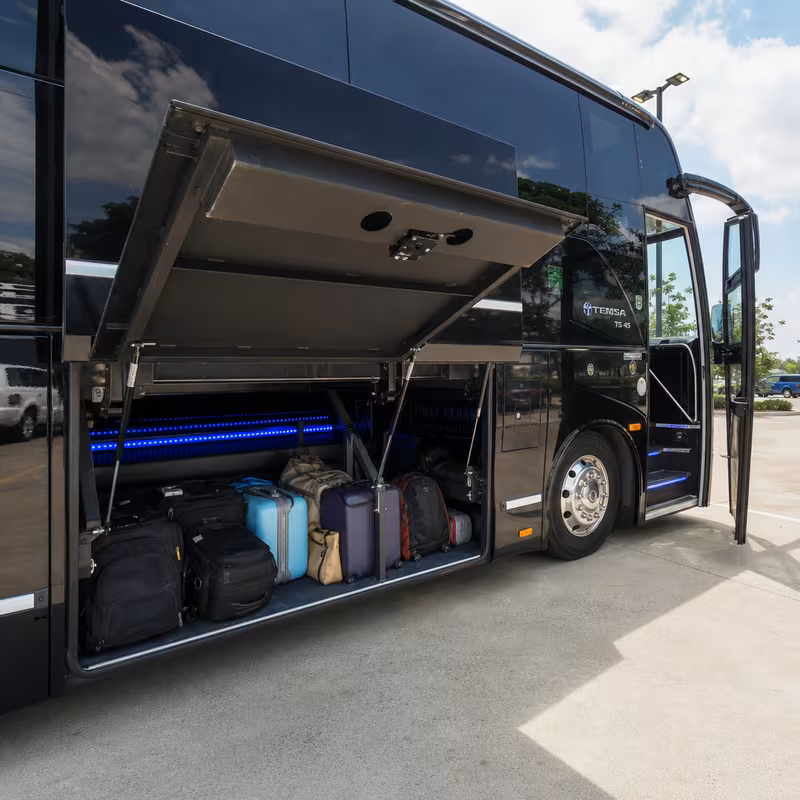 Party bus interior with wraparound leather seating and LED lighting in Jacksonville